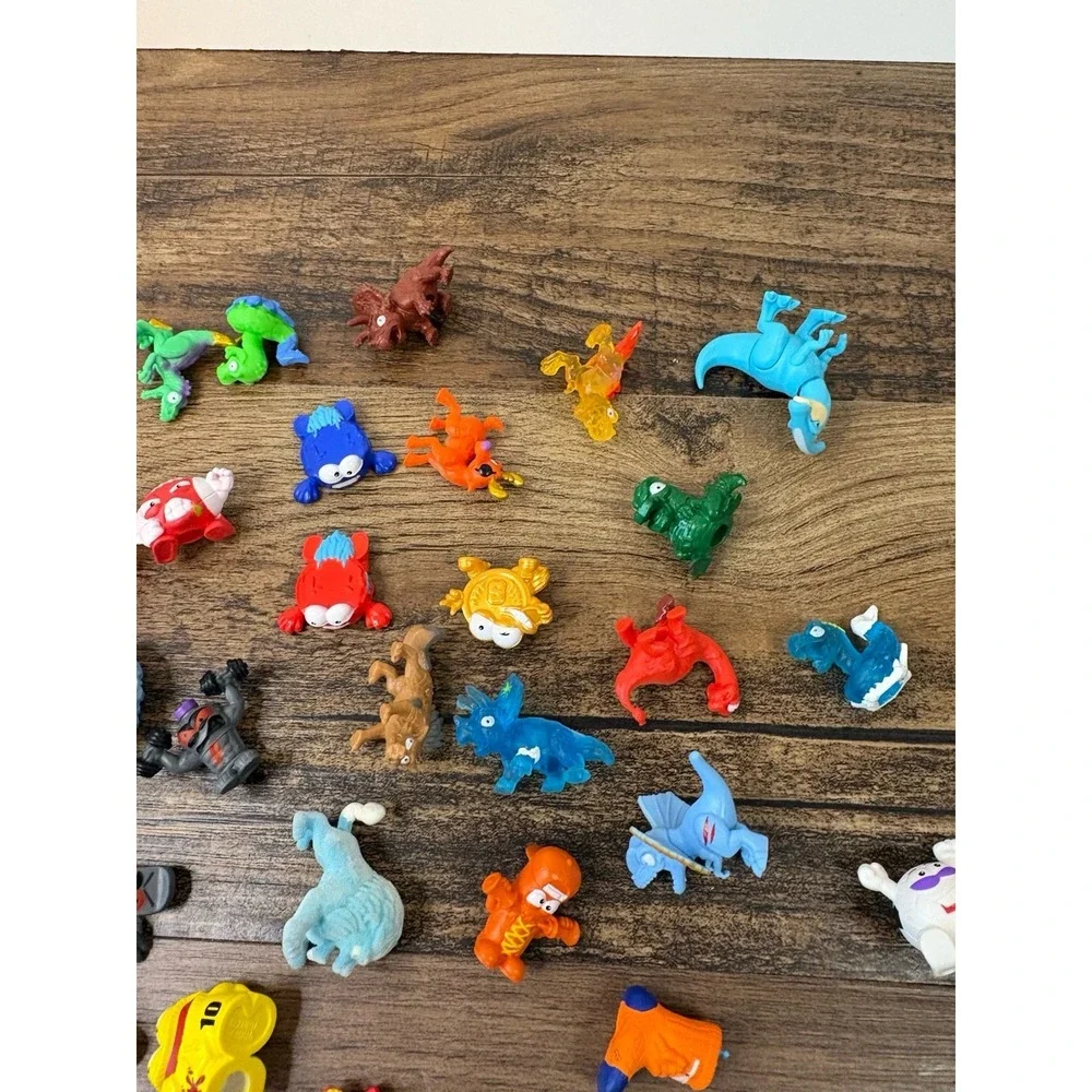 Lot Of Zuru Smashers Mini Figure Lot Squish Squishy Soccer Surfboard Dinosaurs